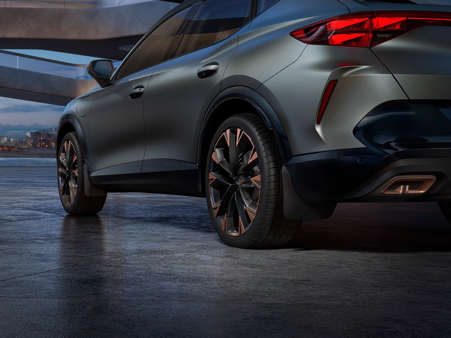  CUPRA Formentor interior showcasing a sleek design, with two individuals setting up the child seat in the back.