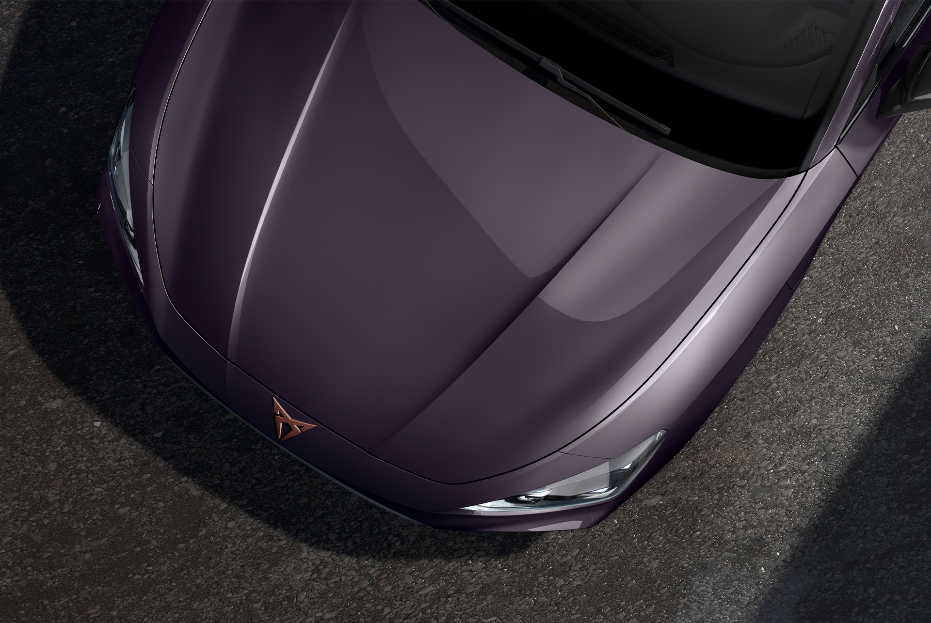 bird’s eye view of a dark void new Cupra Leon Sportstourer 2025 car hood.
