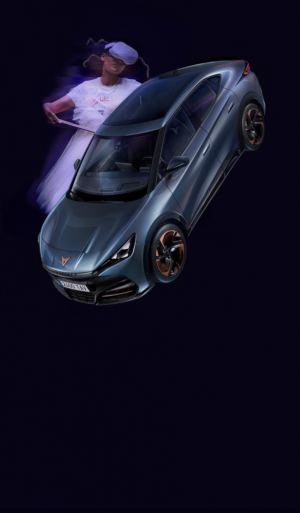 A CUPRA Leon hatchback seen from an elevated angle with its headlights on, next to a person covered in dark, flowing fabric that drapes onto the ground.