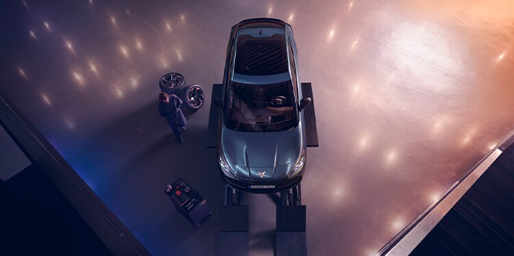 electric vehicle in cupra garage for car maintenance and servicing