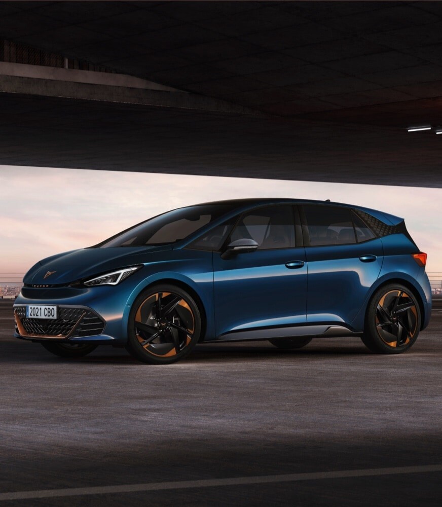 people-posing-on-a-CUPRA-Born-Aurora-blue-colour